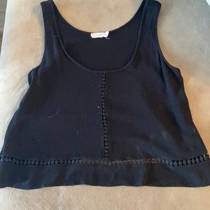 Black float tank top with eyelets